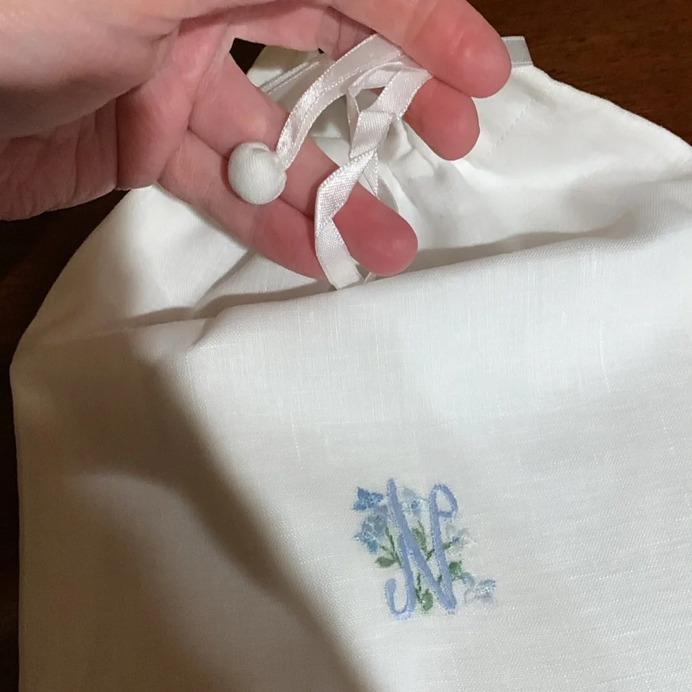 And beautiful hand made rare linen pouch with letter N hand dawn. Brand new!